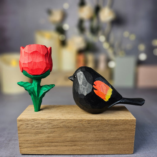 Red-winged Blackbird with Rose - Wooden Islands