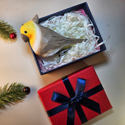 Adornos de pájaros con clip y embalaje en caja de regalo
