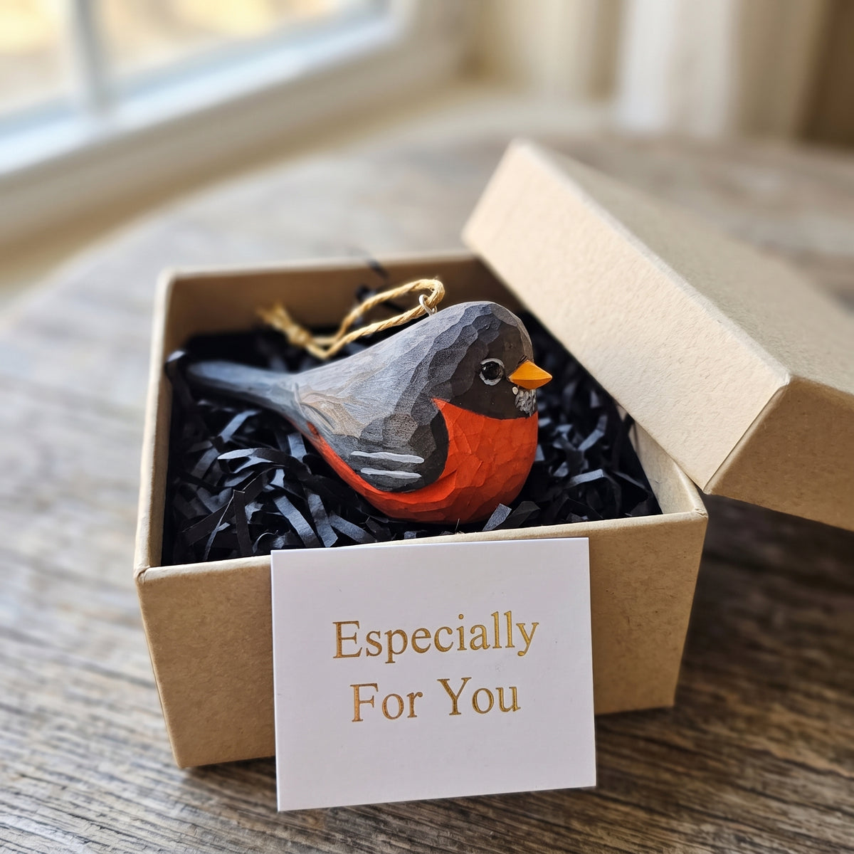 Hand-carved wooden American Robin ornament in a gift box with an "Especially For You" card.