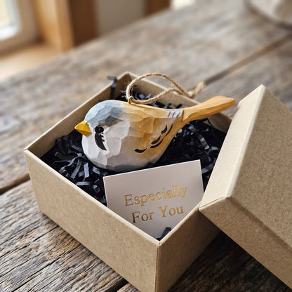 Hand-carved wooden Bearded Tit ornament packaged in a kraft gift box with an "Especially For You" card.