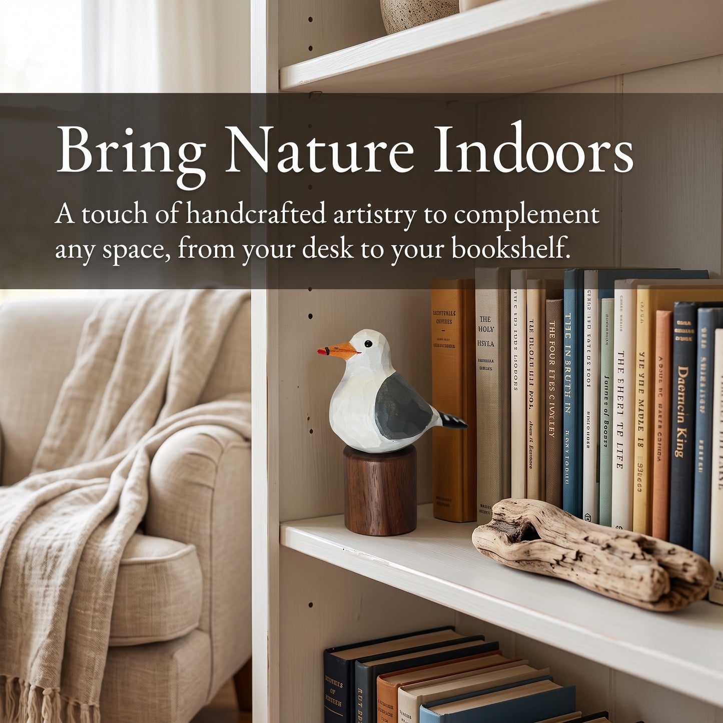 A handcrafted California gull figurine on a wooden base displayed on a white bookshelf next to books and driftwood, with a beige armchair and throw blanket in the background. Text overlay reads: 'Bring Nature Indoors'.
