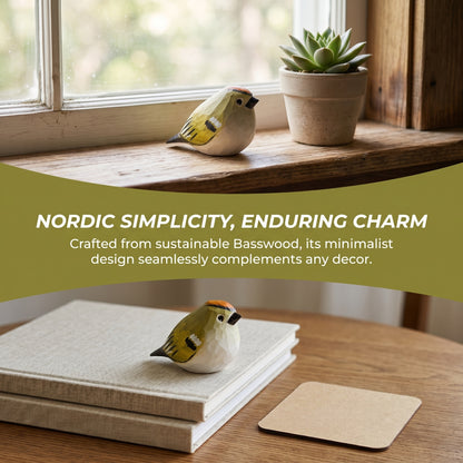 A small Golden-crowned kinglet-shaped decorative object made from sustainable basswood sits on a wooden windowsill next to a potted succulent, and another view shows it resting on stacked books on a wooden table. A green banner reads 'NORDIC SIMPLICITY, ENDURING CHARM' with smaller text below.