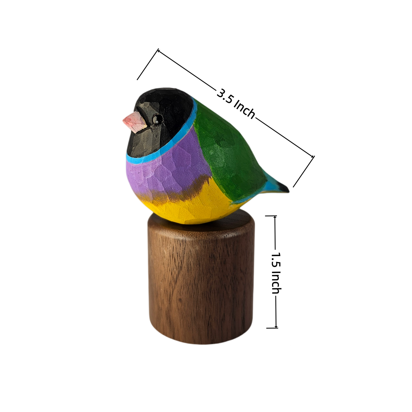 A colorful wooden Gouldian finch sculpture perched on a cylindrical wooden base, shown on a white background with dimension lines indicating 3.5 inch width, 1.
