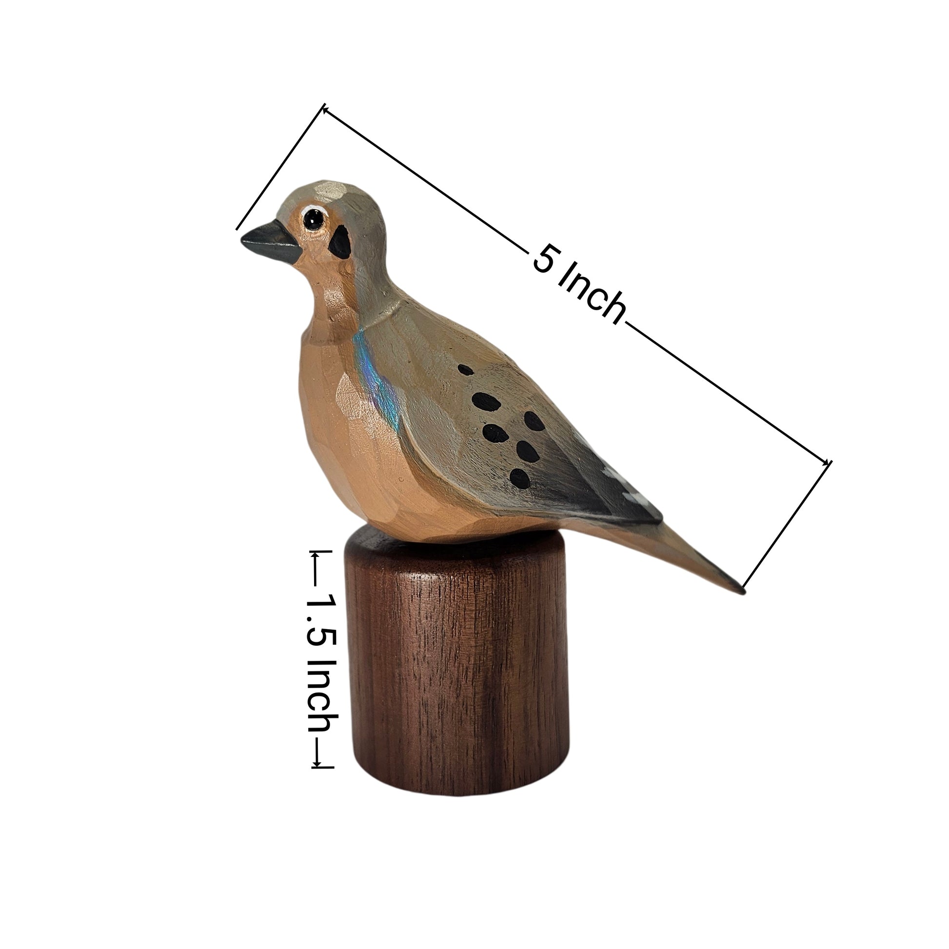 A small painted Mourning Dove figurine on a cylindrical wooden base, shown with dimension lines and text indicating 5 inch length and 1.5 inch height, on a plain white background.