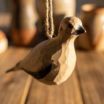 Hand-carved basswood Mourning Dove bird ornament suspended by twine