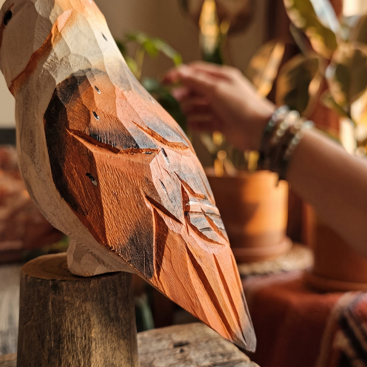 Detailed carved feather textures on a hand-painted basswood barn owl wooden figurine