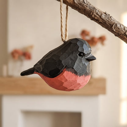 Hand-carved wooden pink robin hanging ornament with twine loop