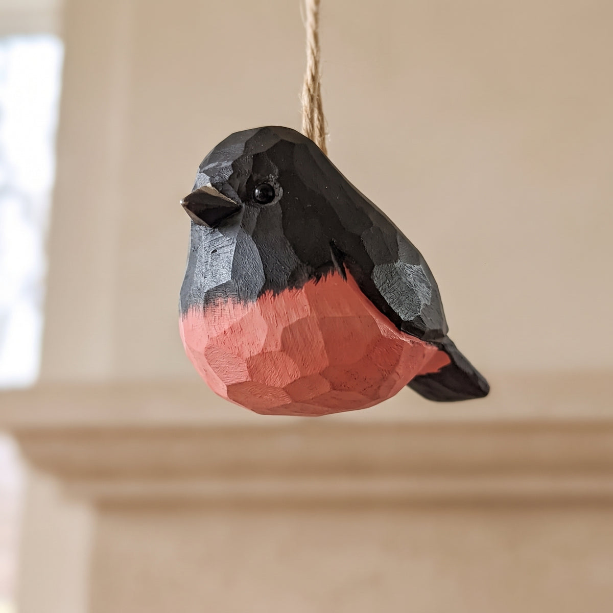 Hand-carved basswood pink robin hanging Christmas ornament.