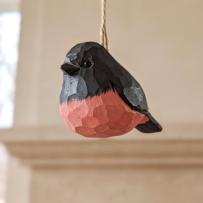 Hand-carved basswood pink robin hanging Christmas ornament.