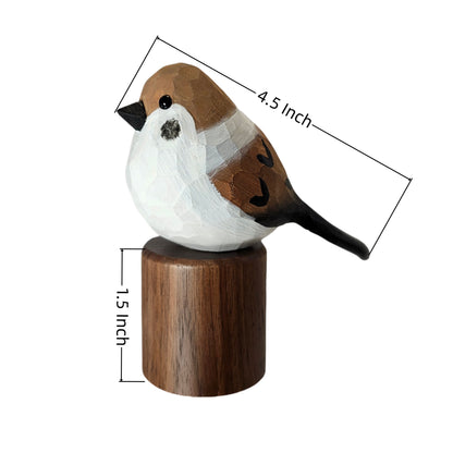 A small painted Sparrow figurine on a cylindrical wooden base, shown with dimension lines indicating a height of 1.5 inch and a length of 4.