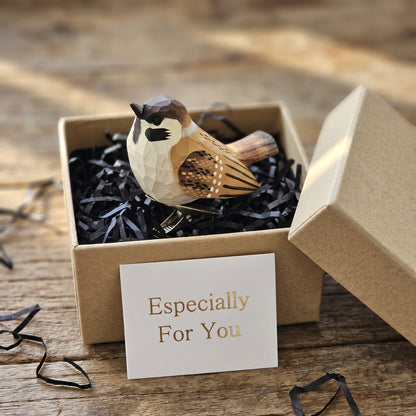 Hand-carved wooden sparrow ornament packaged inside a gift box